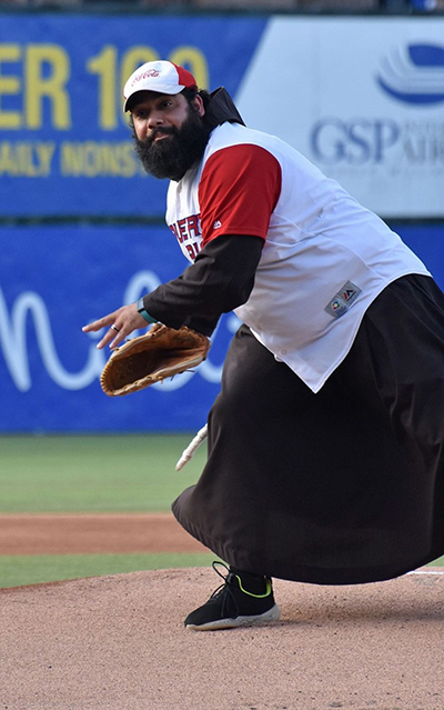 Father Tito Serrano, a Franciscan friar, is a baseball fan who grew up going to games with his father. He will throw out the first pitch at the Marlins game versus the Atlanta Braves on Friday, May 20, and at St. Mark Church in Southwest Ranches on Sunday, May 22, 2022.