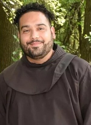 Father Tito Serrano, a Franciscan friar, will accompany his classmate on a tour of all the major ballparks this summer. Their tour will span 17,000 miles and last 11 weeks.