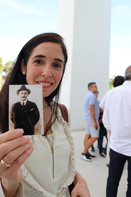 María Gabriela Machado, a Venezuelan devotee of Blessed José Gregorio Hernández, shows a holy card with his image at the conclusion of the Mass celebrated by Cardinal Baltazar Porras of Caracas, May 1, 2022 at Our Lady of Guadalupe Church in Doral.