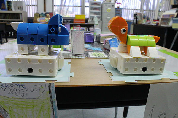 The bots about town: Second graders from Little Flower School in Hollywood made a geometric themed version of their town, and programmed robots to stroll its outer perimeter. The project was part of a STEM Academic Showcase at the school shared with family and friends on May 18, 2022.