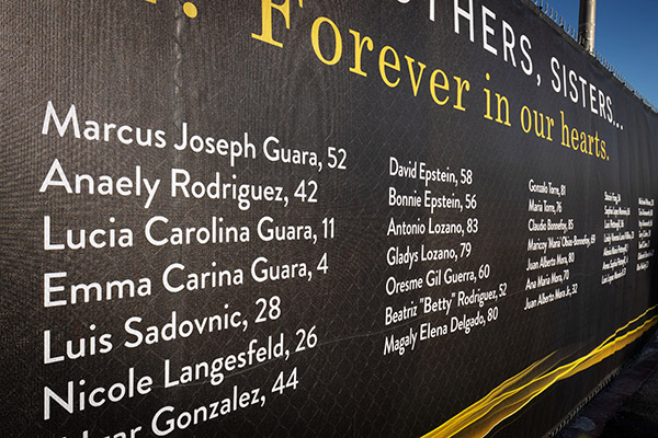 Names of the 98 souls lost a year ago during the June 24 collapse of Miami's Champlain Towers South are inscribed on the new temporary memorial that encircles the now empty site of the 12-story beachfront apartment building on Miami Beach. Its collapse impacted dozens of local Catholic and other families and nearby St. Joseph Parish in particular. Officials have yet to make a final determination as to a specific cause for the collapse.