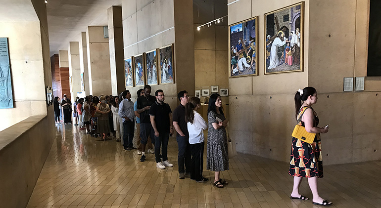 The faithful line up to venerate the relics of St. Bernadette during their Aug. 2, 2022 stop at the Los Angeles cathedral.