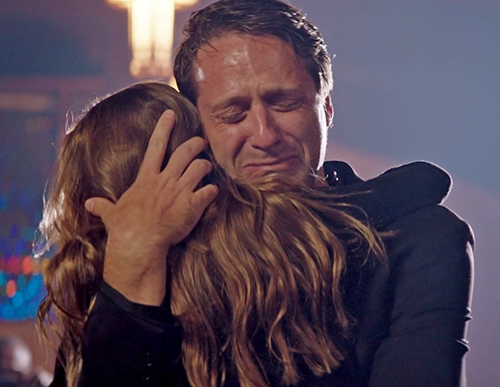 Chloe tearfully embraces her father in the anti-drug film "What About the Kids?"