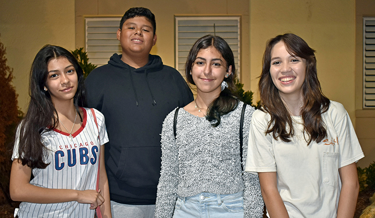 Four eighth-graders praised the anti-drug film "What About the Kids?" after the screening at St. Gregory School in Plantation on Sept. 16, 2022. From left are Jenna Tucci, Nicholas Leon, Harley Rojas and Samantha Smith.