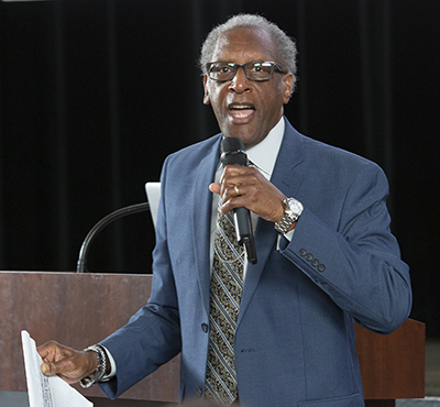 Donald Edwards, associate superintendent of Schools, leads a chorus of "We are one body" with around 250 new teachers - both new to teaching and/or new to archdiocesan Catholic schools - during a spirit-filled and inspiring orientation session Aug. 9, 2022, while gathered at Msgr. Edward Pace High School in Miami Gardens.