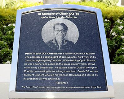 This marker memorializes Christopher Columbus High School senior Danny Quesada, 'Coach DQ,'  who passed away of cystic fibrosis as a senior in 2019. The dedication and blessing of "Coach DQ Courtyard" took place Sept. 8, 2022.