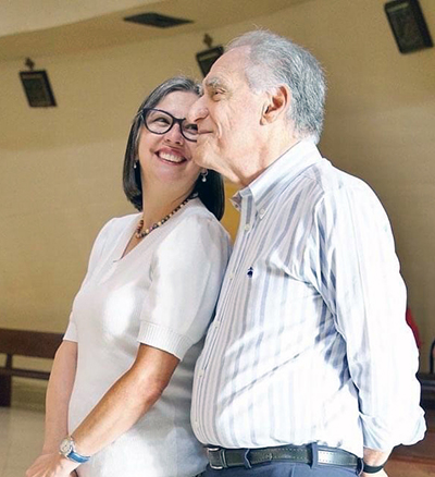 Virgilio Alvares, a Pedro Pan and member of Immaculata-La Salle High School's class of '64, takes part in the Sept. 11, 2022 Mass at the Shrine of Our Lady of Charity along with his wife, Mayaly.
