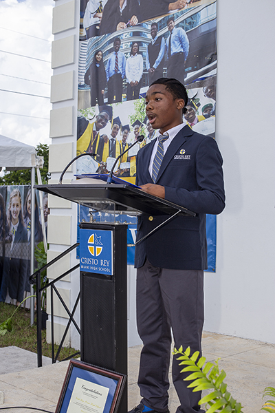 Kain Goree, a student at Cristo Rey Miami high school, addresses the audience during the ribbon-cutting ceremony, Sept. 15, 2022.