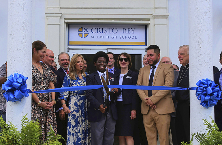 Cutting the ribbon for the new Cristo Rey High School in North Miami, Sept. 15, 2022, from left: Anamarie Moreiras, school president; Rudy Cecchi, board co-chair; Rodger Shay, Jr., board co-chair; Amelie Ferro, Cristo Rey vice president of Corporate Partnerships and Development; Nathaniel James, the first student enrolled; Conor Heaton, board member; Elizabeth Geottl, CEO of the Cristo Rey Network; Cesar Munoz, Cristo Rey Miami's principal; and Archbishop Thomas Wenski.