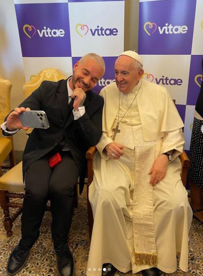 Colombian reggaeton singer J Balvin takes a selfie with Pope Francis during the Vitae Summit 2022 held at the Casina Pio IV in the Vatican, Sept. 1, 2022.