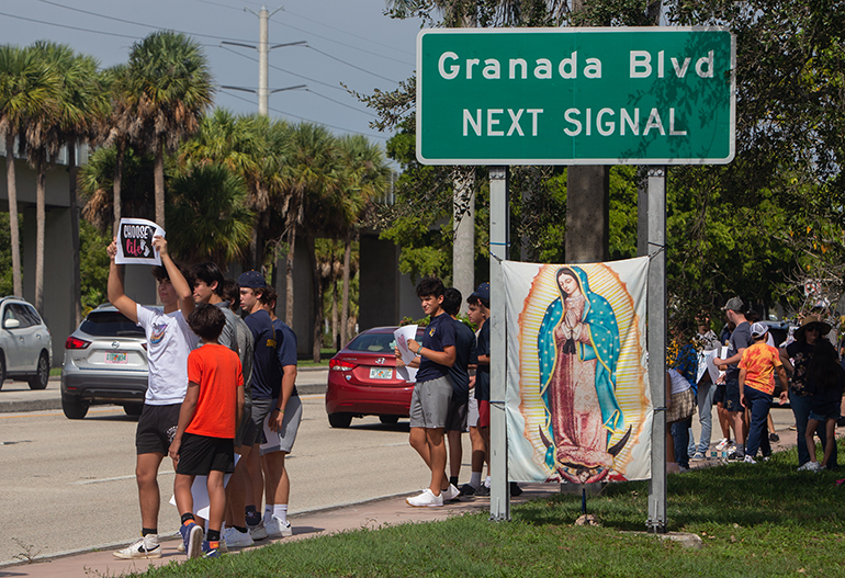 Respect Life members and others demonstrate against abortion along U.S. 1, from Kendall Drive to LeJeune Road, on Respect Life Sunday, Oct. 2, 2022.
