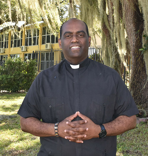 ADOM :: Jericho: The walls came tumbling down - Archdiocese of Miami 3 Father Jean-Mary pauses in front of Notre Dame d'Haiti, scene of the 20th annual Jericho revival week, Oct. 16-22, 2022.
