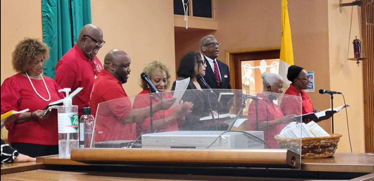 Members of the Black Catholic choir sing during the Mass for Black Catholic History Month, celebrated by Archbishop Thomas Wenski at St. Stephen Church in Miramar, Nov. 5, 2022.