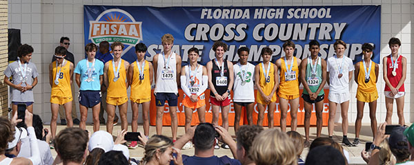 Six Belen runners, in yellow, and St. Thomas Aquinas' Anthony Herrera (#1475) placed in the top 15 at the Boys' Class 3A Florida High School Athletic Association's State Cross Country Championships, held Nov. 5, 2022 in Tallahassee.