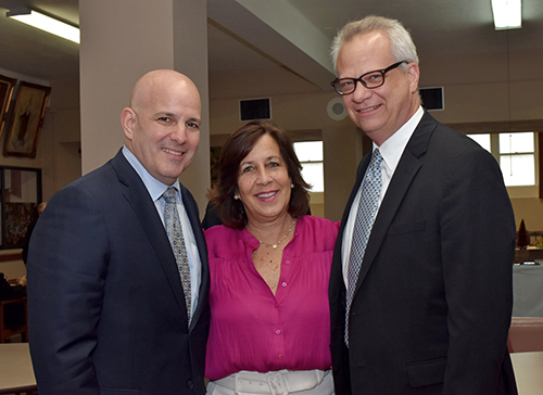 Members of the Miami Catholic Lawyers Guild applaud the choice of William Castro for the 2022 Lex Christi, Lex Amoris Award. From left are Robert Torricella, Annemarie Harris Block and Chris Green.