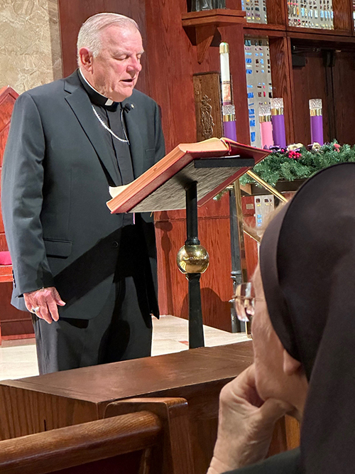 Archbsihop Thomas Wenski delivers the annual Advent reflection for Pastoral Center employees, Nov. 20, 2022 in St. Martha Church, which is located next door to the archdiocesan offices.
