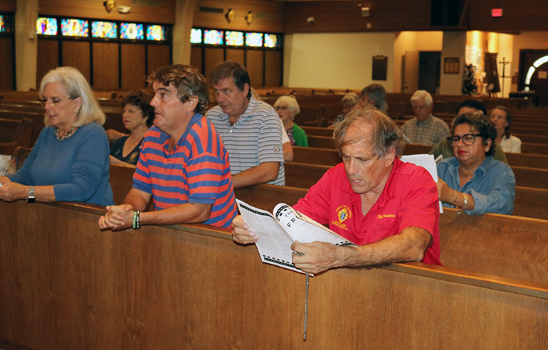 Faithful gather for prayer and adoration Dec. 2, 2022 at St. Gabriel Church in Pompano Beach, which hosted day one of the first Archdiocese of Miami Rosary Congress, held at six parishes Dec. 2-8. The event included 24-hour adoration with people taking turns sitting and praying with the Lord in the Eucharist.