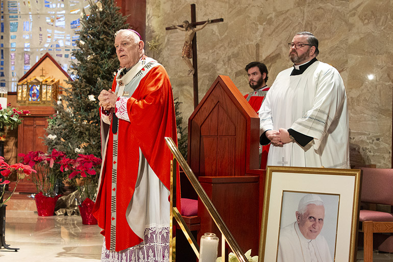 Archbishop Thomas Wenski celebrates a memorial Mass for Pope emeritus Benedict XVI on the same day of his funeral in Rome, Jan. 5, 2023. The Mass was celebrated at St. Martha Church in Miami Shores, next door to the Pastoral Center. Pope Benedict XVI died Dec. 31, 2022.