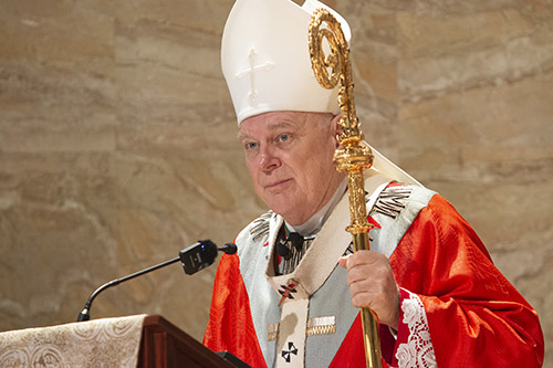 Archbishop Thomas Wenski preaches the homily while celebrating a memorial Mass for Pope emeritus Benedict XVI on the same day of his funeral in Rome, Jan. 5, 2023. The Mass was celebrated at St. Martha Church in Miami Shores, next door to the Pastoral Center. Pope Benedict XVI died Dec. 31, 2022.
