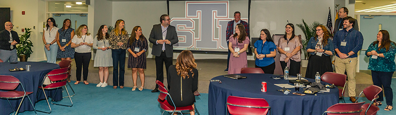 The 14 archdiocesan educators who make up the first cohort of students in the master's in educational leadership program for future Catholic school principals are recognized during a kickoff event at St. Thomas University in Miami Gardens, Jan. 8, 2023.