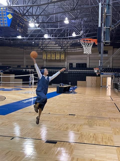 Sister Irene Regina of the Daughters of St. Paul still shoots hoops when she gets a chance. Her friend and college teammate, Carmelite Sister Margaret Ann Laechelin, when asked if they were up to a friendly competition just for old times' sake. , said â€œwe could probably set up something here at (Archbishop Carroll) high school whenever Sister Irene Regina has time.â€