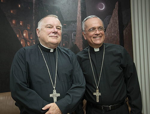 In this file photo, Archbishop Thomas Wenski poses in his office with Managua Auxiliary Bishop Silvio Baez, who visited April 26, 2019, after being forced to leave Nicaragua due to his outspoken support of those protesting Daniel Ortega's regime. Bishop Baez now teaches at St. Vincent de Paul Regional Seminary in Boynton Beach and has been helping to arrange housing for the 200 or so political prisoners released by the Nicaraguan government Feb. 9, 2023.