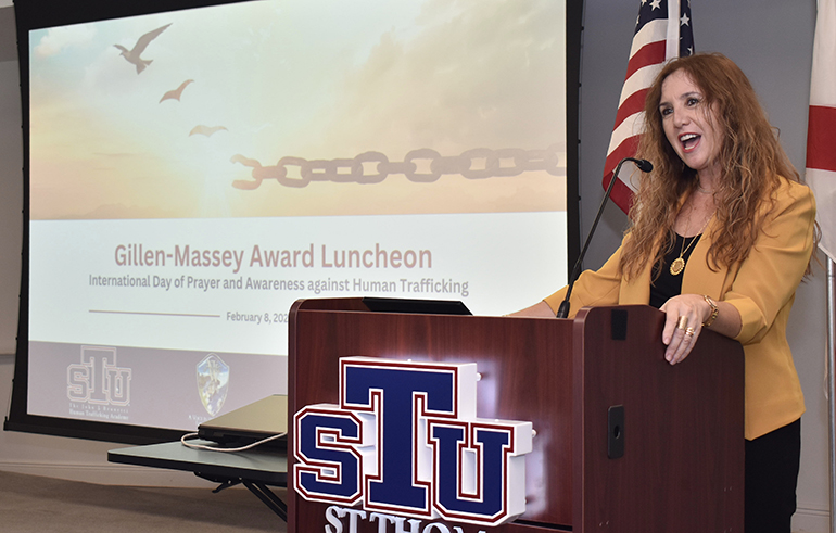 "We celebrate all those who do not just curse the darkness but light a candle," says Roza Pati of the Human Trafficking Academy at St. Thomas University, during the annual Gillen-Massey award luncheon held at the university Feb. 8, 2023.