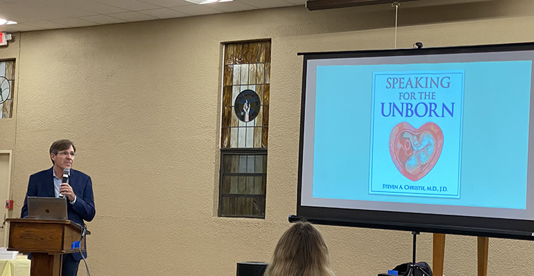 Dr. Steven A. Christie makes a point about pre-natal development during the "Speaking for the Unborn" talk hosted by FIU Catholic Panthers at St. Agatha Parish Hall, Jan.21, 2023.