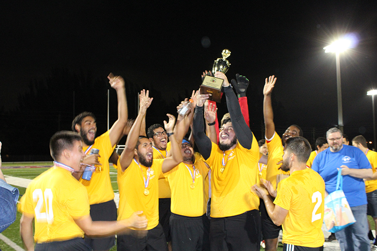Seminarians celebrate after winning the first Archbishop's Cup. Archdiocesan seminarians defeated the priests 3-0 in the inaugural Archbishop's Cup soccer game, played Feb. 3, 2023 on the field at St. Thomas University, Miami Gardens.