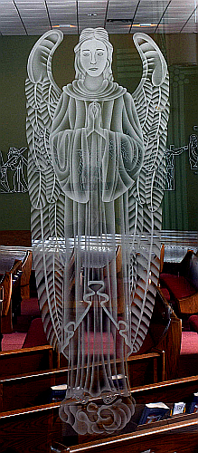 Six angels are etched into the glass walls of the chapel at Blessed Sacrament Church.