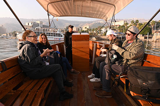 Visitors to the Holy Land take a peaceful morning excursion on a "Jesus boat" on the Sea of Galilee in Tiberias, Israel. Tourism to Israel and the Holy Land has rebounded following the global pandemic and lockdowns that began in 2020, but the ongoing war between Russia and Ukraine has presented other setbacks.