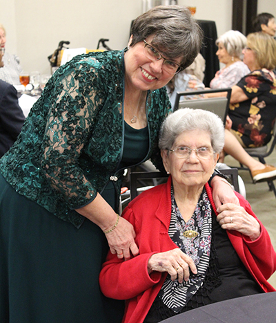 Ana Rodriguez-Soto, editor of the Florida Catholic Miami edition, poses with her mother, Carmen Rodriguez, at the Miami Archdiocesan Council of Catholic Women's scholarship luncheon, held Feb. 25, 2023, at the Embassy Suites in Fort Lauderdale. Rodriguez-Soto was recognized for continued support in fostering Catholic education in the Archdiocese of Miami.