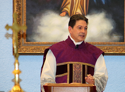 Father Alfredo Rolon, pastor of St. Malachy Church, announces the reopening of the parish school during Masses the weekend of March 4 and 5, 2023.
