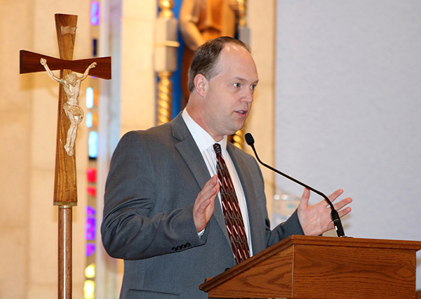 Jim Rigg, secretary of Education and superintendent of Schools for the Archdiocese of Miami, talks during a Mass March 5, 2023, about the reopening of St. Malachy School in Tamarac.