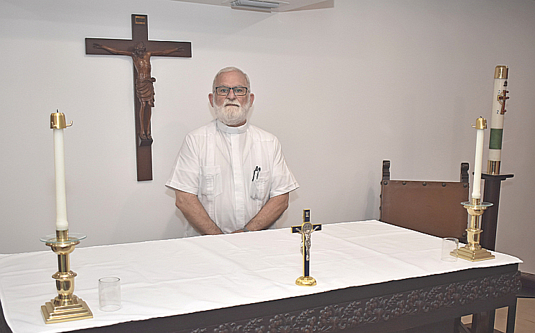 Father Joseph Maalouf shows the altar at the chapel of St. Jerome Church, Fort Lauderdale. He said he'll say Mass daily there, livestreamed via YouTube and the church website, until the main building is restored.