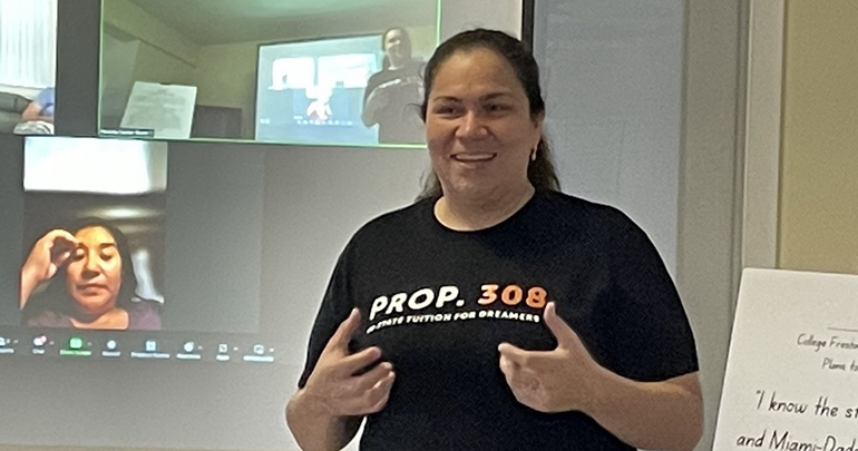 Gaby Pacheco, a former Dreamer who now directs The Dream.US, speaks to those gathered at the Poveda Center in Miami for the presentation on Dreamers, March 25, 2023.