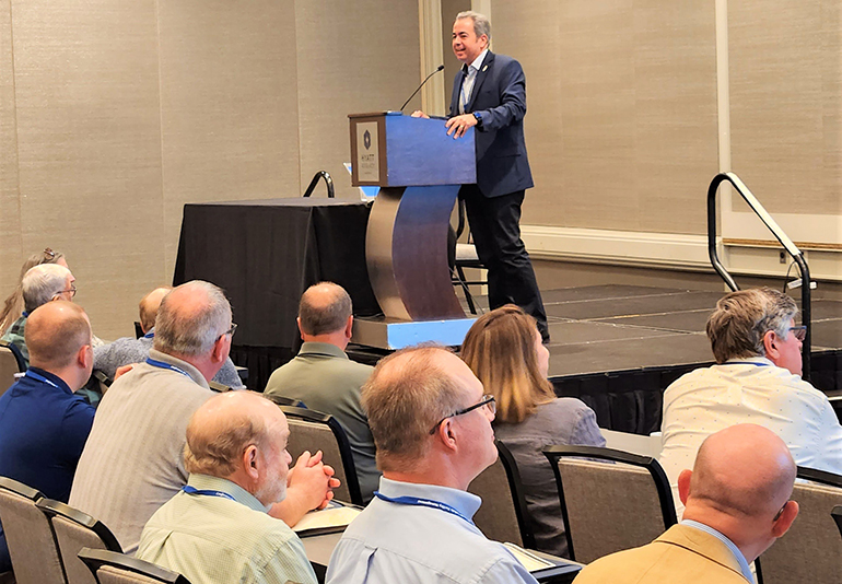 David Prada, senior director of the Office of Building and Property at the Archdiocese of Miami, speaks as master of ceremonies at the 27th annual Conference for Catholic Facility Management (CCFM) in Baltimore, Maryland, held April 30-May 3, 2023. The national association consists of 120 archdiocesan and diocesan members, 55 religious institutes, and more than 85 corporate members. Prada was named president of the board of directors for the fourth time.