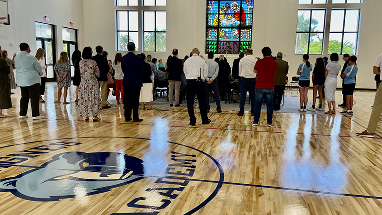 A view of the St. Agnes Academy logo painted on the floor of the new sports and multipurpose center, which was blessed by Archbishop Thomas Wenski in Key Biscayne, May 15, 2023.