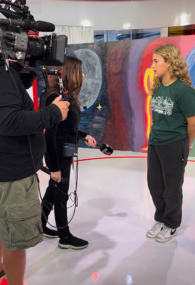 Immaculata-La Salle High School sophomore Carolina Moreno is interviewed while taking part in a livestreamed question-and-answer session with Pope Francis as part of the 10th anniversary celebration for Scholas Occurrentes, May 25, 2023.