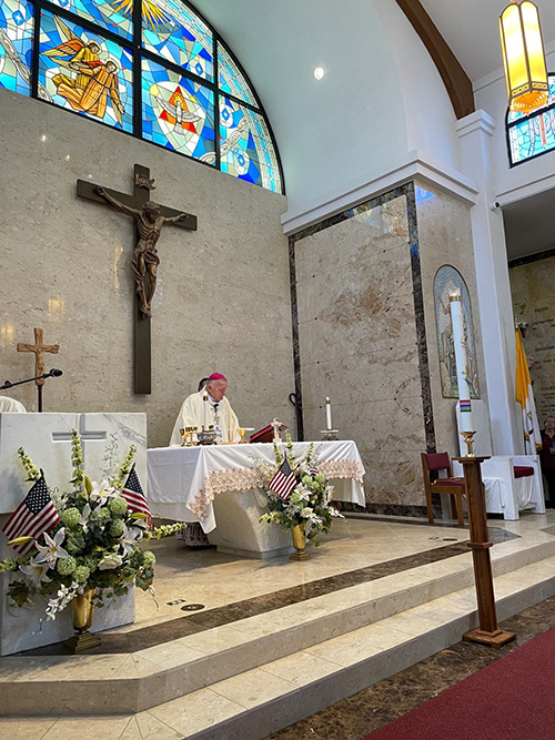 Archbishop Thomas Wenski celebrates the Memorial Day Mass at Our Lady Queen of Heaven Cemetery in North Lauderdale, May 29, 2023.
