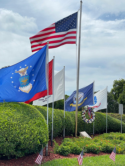 Flags adorn the military veterans section of Our Lady Queen of Heaven Cemetery in North Lauderdale on Memorial Day, May 29, 2023.