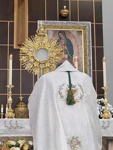 Archbishop Thomas Wenski prays before the Blessed Sacrament after celebrating the opening Mass of the annual Great Vigil marking the feasts of the Sacred Heart of Jesus and the Immaculate Heart of Mary, the evening of June 16 through the morning of June 17, 2023, at Our Lady of Guadalupe Church in Doral.