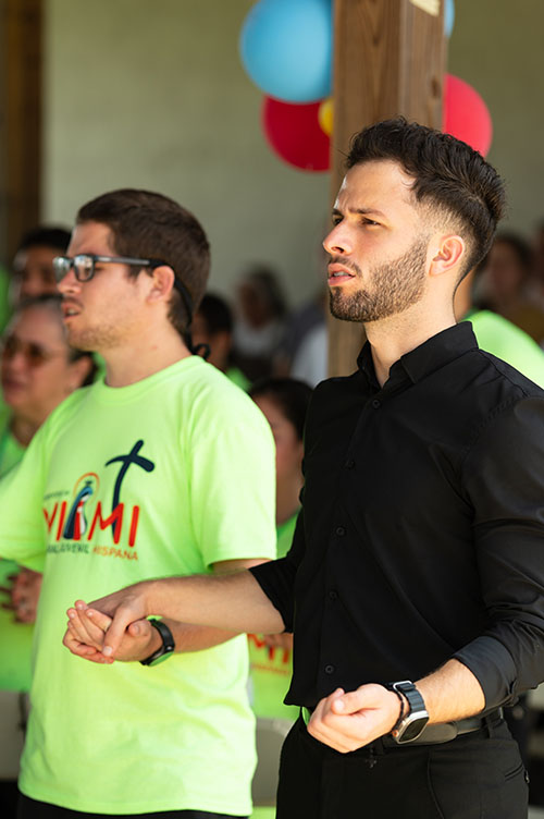 Miami young adults pray Aug. 6 at the closing Mass of World Youth Day Miami in the Land of the Pierced Hearts in Homestead. The Mass concluded a weeklong series of parallel World Youth Day 2023 events to mirror those underway in Lisbon, Portugal, for the many here who were unable to travel to Lisbon.