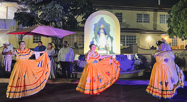 The Ballet Folklorico Nuestras Raíces Nicaraguenses performs traditional dances during the "Gritería Chiquita" (small shouting) to the Virgin Mary, after the Mass that was celebrated Aug. 15, 2023 at St. John the Apostle Church, Hialeah.