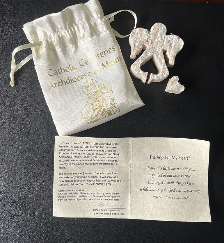 "All our families who lose children are also given a special remembrance angel made from Jerusalem stone and a beautiful prayer card with a poem dedicated to their child," said Mary Jo Frick, executive director of Catholic Cemeteries of the Archdiocese of Miami.