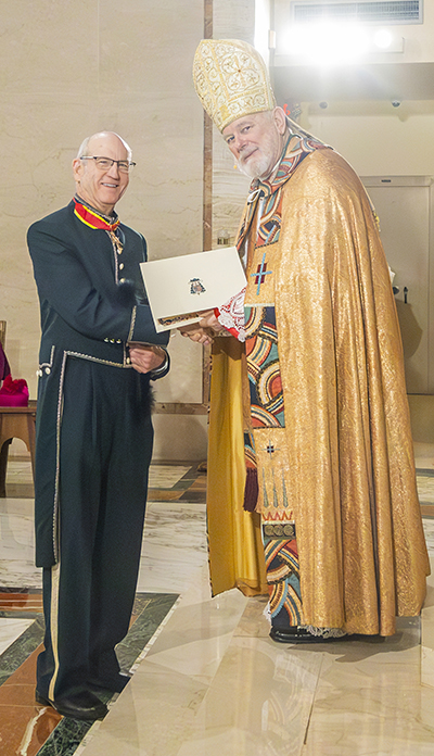 Archdiocesan attorney J. Patrick Fitzgerald received the Knight Grand Cross of Saint Gregory the Great promotion from Archbishop Thomas Wenski during the Archdiocese of Miami's 65th anniversary vespers service, Oct. 22, 2023, at St. Mary Cathedral.