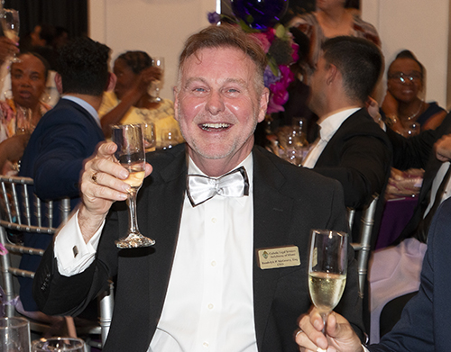 "Cheers to 25," says CEO Randolph McGrorty at the gala marking Catholic Legal Services' 25th anniversary, Oct. 27, 2023, at the Hilton Doubletree Grand Bay in Miami.