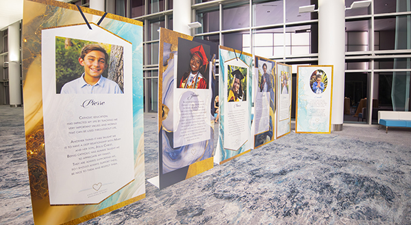 Display of testimonies from students and alumni of archdiocesan schools at the 65th anniversary gala for the Archdiocese of Miami, Nov. 11, 2023, at the Miami Beach Convention Center.