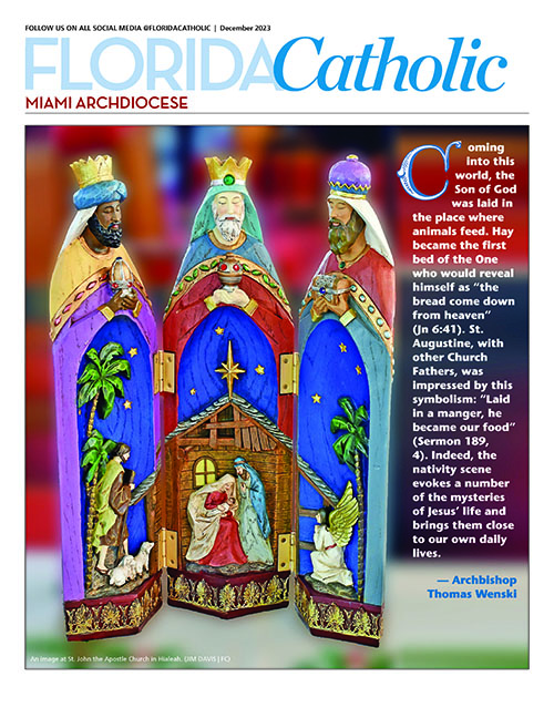 The front page of the December 2023 edition of the Florida Catholic features a triptych of the Wise Men atop a table, with insets showing a Nativity scene. It was photographed by Jim Davis for a feature on the artworks at the parish that ran in December 2022.