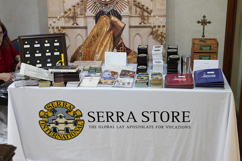 Items used by the Serra Club to foster vocations are on display at the Jan. 18-21, 2024, Serra USA Rally in Miami.